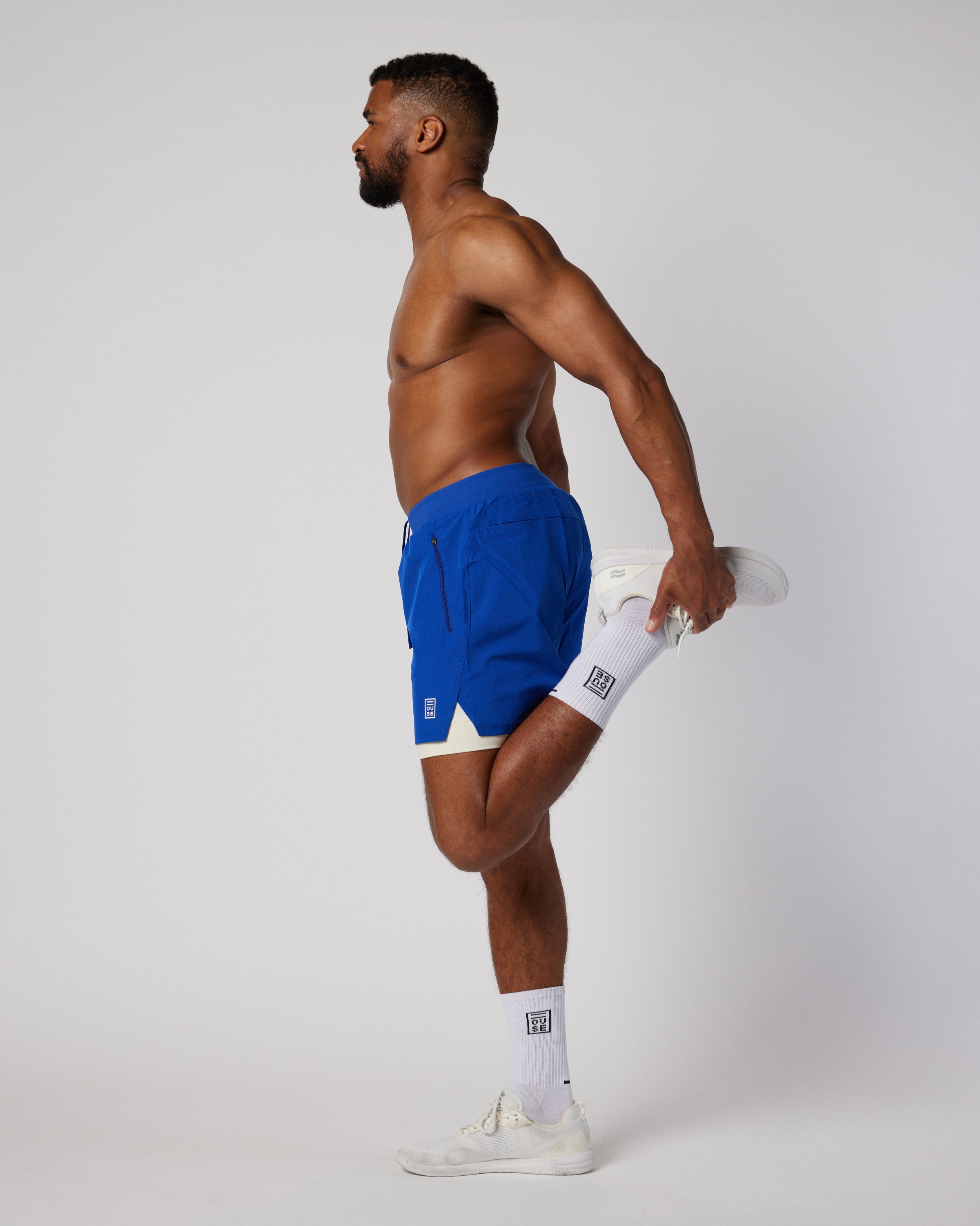 Mens lined sports shorts in blue and white