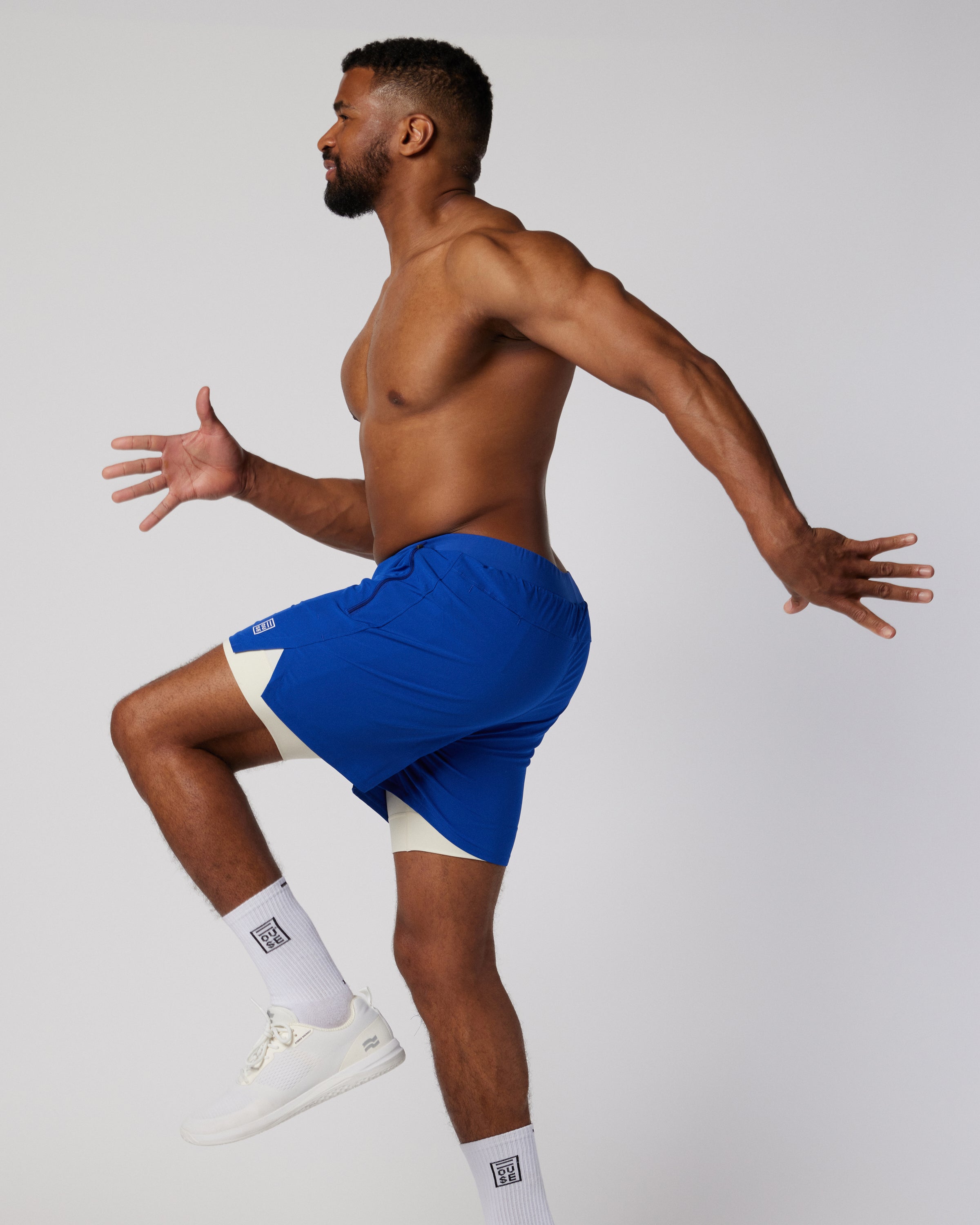 Mens lined sports shorts in blue and white