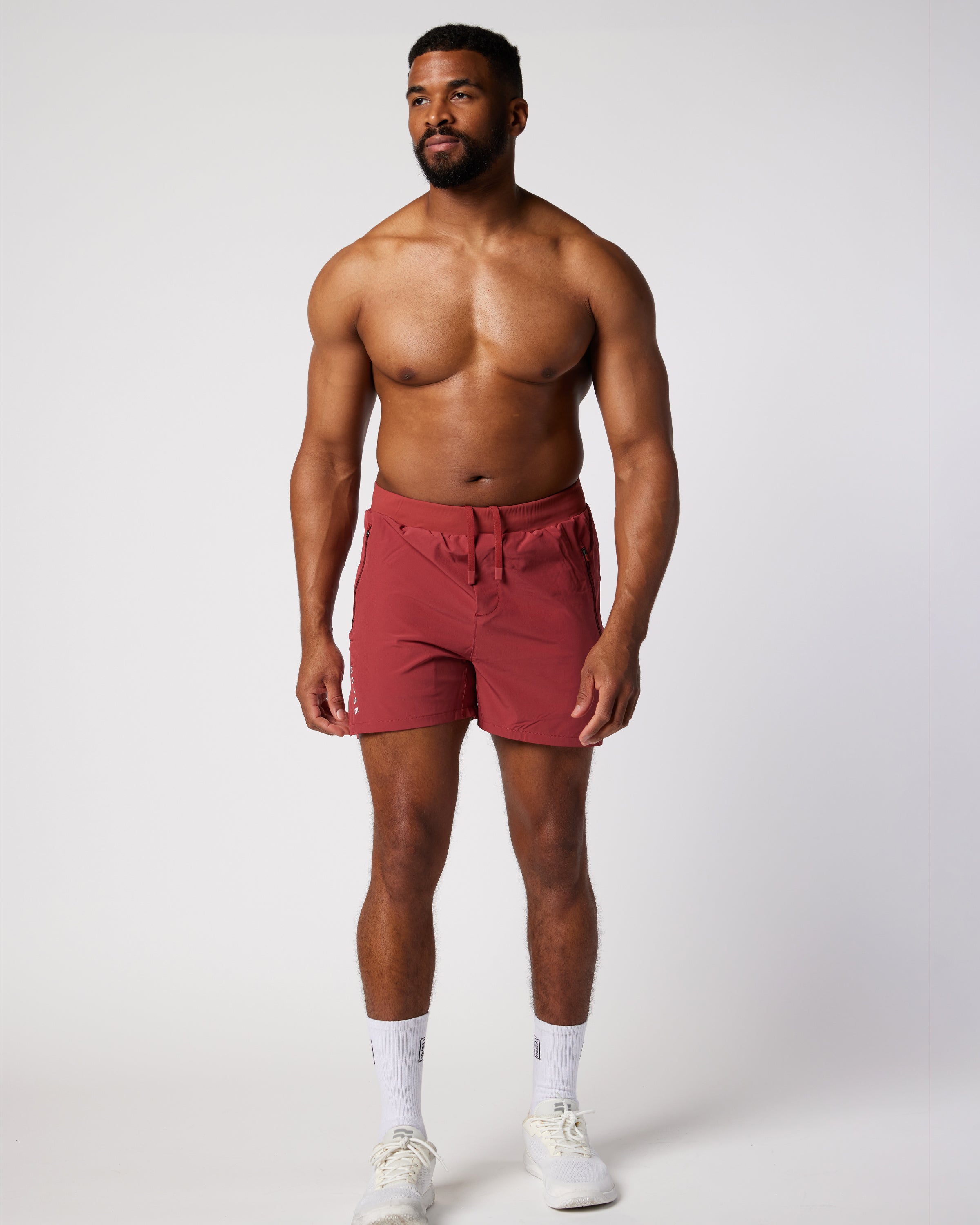 Mens unlined sports short in Mars Red