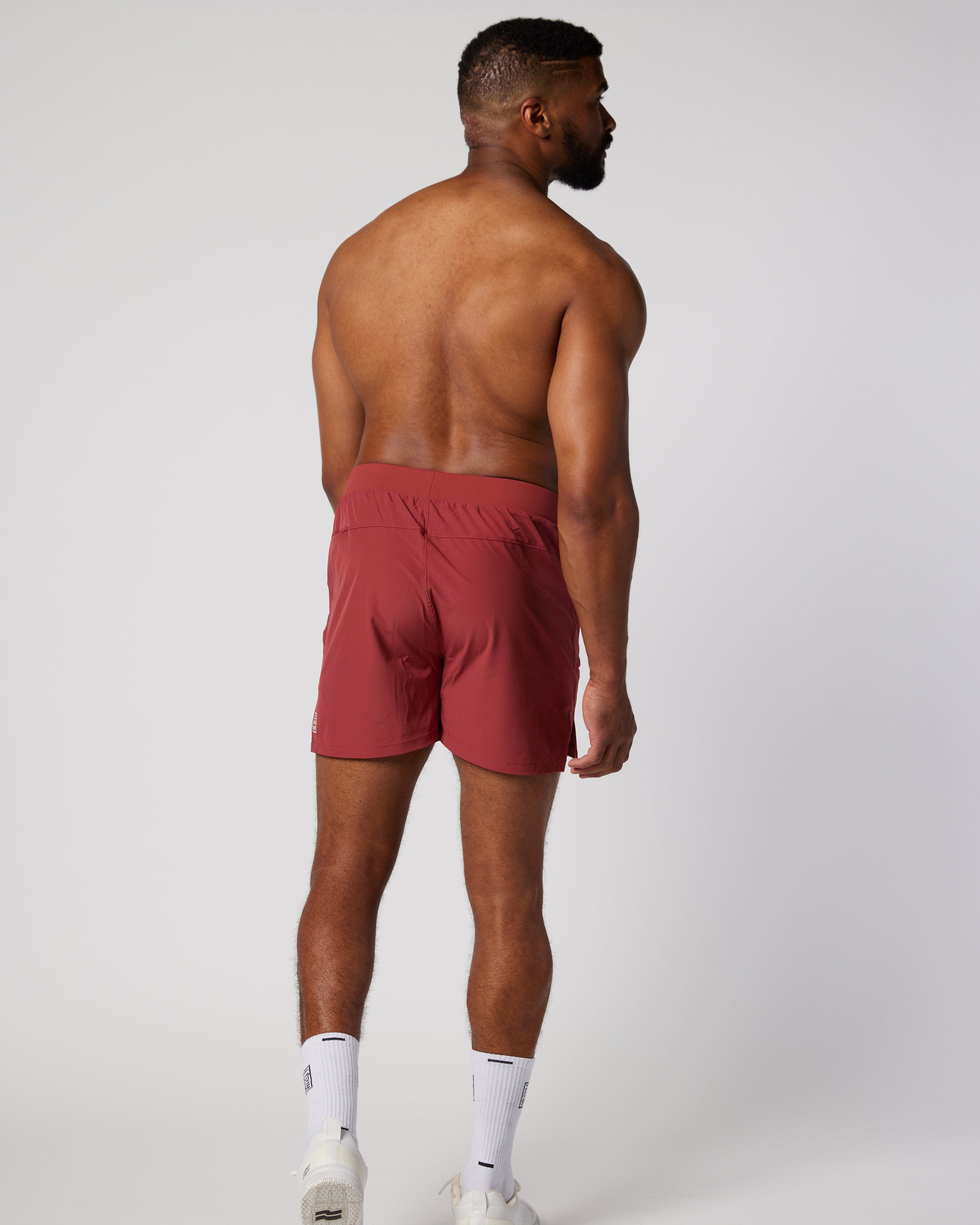 Mens unlined sports short in Mars Red